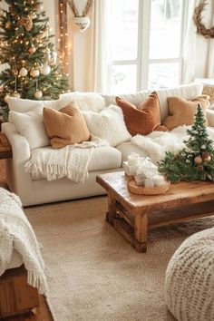 a living room filled with lots of furniture and a christmas tree in the window sill