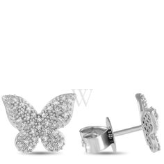 These charming butterfly earrings will instantly captivate. Each one features a textured 14K white gold butterfly shaped setting that measures 0.45 round. Diamonds with a total weight of 0.16 carats make them perfect for adding a touch of luxury to any outfit or occasion.This jewelry piece is offered in brand new condition and includes a gift box. LB Exclusive Ladies Earrings. SKU: ER28699-W-W. Color: Multi-Color. Metal Type: Gold. Metal Stamp: 14k. Gem stone type: Diamond. Earrings style: Precious Metal. LB Exclusive 14K White Gold 0.16ct Diamond Butterfly Earrings ER28699 W. Weighs 1.6g. Diamond Butterfly, Fine Pens, Gold Models, Cheap Gifts, Butterfly Shape, Fragrance Gift Set, Gold Butterfly, Butterfly Earrings, Precious Metal