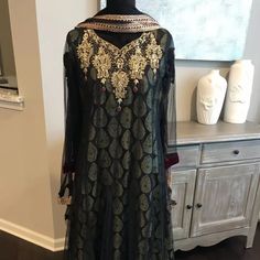 Hi, I Am Selling A New Pakistani Black Jamawar Maxi Dress 3-Piece Suit For Womens In Size 8. Any Questions Please Ask. All Items Come From A Pet-Free And Smoke-Free Home. Measurements: Shoulder: 15 Inchesbust: 17 Inches Waist: 17 Inches Pants: Waist: 32 Length: 56 Inches Shirt Can Be Altered, There Is Fabric Inside Formal Anarkali Dress With Zari Work, Fitted Black Churidar For Festive Occasions, Festive Black Fitted Churidar, Formal Black Set With Sheer Dupatta, Semi-stitched Black Churidar With Self Design, Fitted Black Salwar Kameez With Sheer Dupatta, Designer Wear Black Fitted Churidar, Elegant Salwar Kameez With Sheer Dupatta And Long Sleeves, Transitional Anarkali Dress For Party