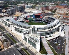 an aerial view of a baseball stadium in the city