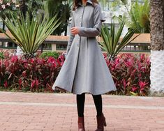 * A midi length woolen coat, A-line shape, warm and comfortable. * Fully lined with two side pockets, closure with buttons. * Coat dress shape, make you look more taller and slimmer. * Material: out shell - 50% wool, 50% polyester; lining - 100% polyester * Care: dry cleanable * Shop sizing chart FYI ( made according to US sizing. actual body figures, not laying flat clothes measurements) Size XS (US 2, UK 6, German 32, French 34, ) Bust: fits bust around 33.5 inches/85cm Waist: fits waist aroun Elegant Long-sleeved Merino Wool Sweater Coat, Classic Long-sleeve Gray Sweater Coat, Chic Single-breasted Wool Coat With Stand Collar, High Neck Coat, Vintage Single-breasted Wool Coat With Long Sleeves, Winter Coat Dress, Single-breasted Cashmere Wool Coat With Lapel Collar, Asymmetrical Coat, Princess Coat