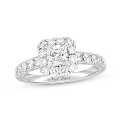 a diamond engagement ring with the words, all love written on it and surrounded by diamonds