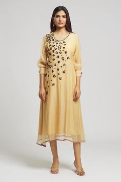 Beige kurta with sequin and bead embroidered floral patterns. - Aza Fashions Hand Embellished Embroidered Dress For Eid Festival, Hand Embellished Semi-stitched Kurta, Traditional Embellished Embroidered Dress For Designer Wear, Embellished Chanderi Kurta For Transitional Season, Traditional Summer Kurta With Sequins, Fitted Anarkali Kurta With Hand Embellished Details, Fitted Anarkali Kurta Hand Embellished, Transitional Embellished Chanderi Kurta, Traditional Sequined Summer Kurta