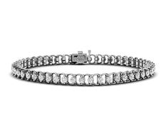 1.00-3.00 CT Round Cut Lab Grown Diamonds - Tennis Bracelet1.00 Carat: 44 round cut diamonds weighing 1.00 carat2.00 Carat: 36 round cut diamonds weighing 2.00 carat3.00 Carat: 34 round cut diamonds weighing 3.00 carat Exquisite Round Cut Diamonds: Adorn your wrist with the stunning beauty of our 1.00-3.00 carat round lab grown diamonds, known for their exceptional brilliance and timeless elegance. Tennis Bracelet Design: Embrace classic sophistication with a tennis bracelet featuring a continuo Bracelet Design, Tennis Bracelet Diamond, Gold Platinum, Tennis Bracelet, Round Cut Diamond, Bracelet Designs, Or Rose, Lab Grown, Lab Grown Diamonds