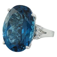 Stamped: 14K Total Ring Weight: 6.2 Grams Topaz Weight 25.00 Carat (20.00x15.00 Millimeters)Diamond Weight: 0.30 carat (F-G Color, VS2-SI1 Clarity )Face Measures: 20.00x20.90 Millimeter SKU: [600498] Oval Diamond Gemstones For Formal Occasions, Formal Oval Diamond Gemstones, Oval Center Stone Gemstones For Formal Occasions, Oval Gemstones With Prong Setting For Formal Occasions, Formal Sapphire Ring With Cushion Diamond Cut, Formal Sapphire Ring With Cushion Cut, Luxury Diamond Cut Gemstones For Formal Occasions, Luxury Platinum Topaz Ring With Accent Stones, Luxury Baguette Cut Gemstones