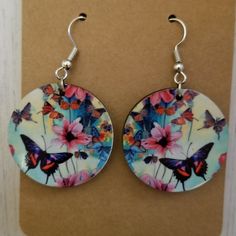 Beautiful Handmade Butterflies Round Earrings, Size Is 1 Inch In With. Feel Free To Ask Any Questions! We Try To Ship Same Day Or Next, Except Weekends. Bundle And Save! Add 4 Or More Items To Your Bundle (Applicable To Items Under $75) And We Will Offer A 50% Off Offer. Or Make Us Offers! We Are A Non Smoking, Dog Friendly Household. While I Can't Guarantee You Won't Find A Stray Hair, Everything Is Cleaned And Packed Until Shipping. We Do Recycle Shipping Materials. Thank You For Looking And H Handmade Butterflies, Rasta Earrings, Creepy Earrings, Blue Crystal Earrings, French Hook Earrings, Glass Ball Ornaments, Pumpkin Earrings, Paper Jewelry, Fish Hook Earrings