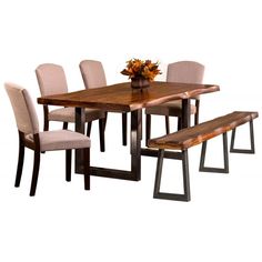 a dining table with six chairs and a bench