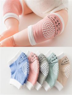 four pairs of baby socks with different designs on the arms and feet, all in pastel colors