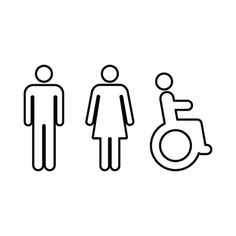 two people standing next to each other in front of a toilet with a wheel chair