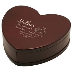 a heart shaped wooden box with the words, friends and paw prints on it's lid