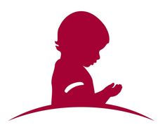 a silhouette of a baby sitting on top of a red blanket with his hands together