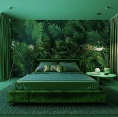 a green bedroom with palm leaves on the wall and carpeted floor, along with a large bed