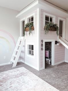 there is a loft bed with stairs to the top and bottom floor in this room