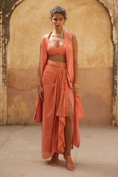 Peach orange jacket with placement floral embroidery. Paired with an inner padded blouse and pre-stitched wrap skirt. - Aza Fashions Peach Party Sets, Paulmi And Harsh, Peach Jacket, Peach Clothes, Coral Outfit, Placement Embroidery, Color Outfits, Lehenga Wedding, Padded Blouse