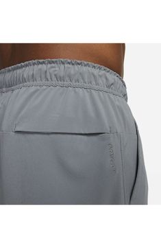 Stretchy, sweat-wicking fabric takes you from workouts to distance runs in all-activity shorts fitted with pockets for your keys, energy gels and smartphone. They're cut with room to move in a fit that stays out of your way in the gym, on the roads or in the yoga studio. 5" inseam; 28" leg opening; 13 1/2" front rise; 16" back rise (size Medium) Dri-FIT moisture-wicking technology 86% polyester, 14% spandex Machine wash, tumble dry Imported Nike Gray Activewear With Built-in Shorts, Nike Activewear With Built-in Shorts And 4-way Stretch, Gray Moisture-wicking Athletic Shorts For Training, Gray Gym Activewear With Elastic Waistband, Nike Athletic Shorts With Built-in Shorts And 4-way Stretch, Breathable Gray Athletic Shorts For Workout, Gray Activewear With Elastic Waistband And 4-way Stretch, Gray 4-way Stretch Activewear With Elastic Waistband, Nike Athletic Shorts With Breathable Fabric