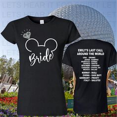 a black tshirt with the words bride and mickey mouse ears on it in front of a building