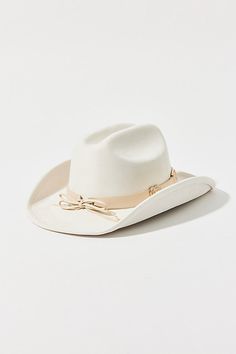 So in love with this cowboy hat in a structured silhouette complete with a heart-topped band. Features Heart cowboy hat Structured cowboy hat Heart accents at the band Lightweight fit and feel Content + Care 100% Polyester Spot clean Imported | Heart Cowboy Hat in Ivory, Women's at Urban Outfitters Heart Cowboy Hat, Howdy Hat, Autumn Sales, So In Love, Cowboy Hat, Playing Dress Up, Cowboy Hats, Women's Accessories, Accessories Hats