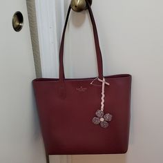 New With Tag Kate Spade Tote Bag Burgundy Color Kate Spade Burgundy Bags For Everyday Use, Kate Spade Burgundy Leather Bag, Chic Kate Spade Bag As A Gift, Kate Spade Red Tote Shoulder Bag, Kate Spade Red Bags For Daily Use, Kate Spade Red Shoulder Bag For Everyday, Kate Spade Shoulder Bag With Leather Handles For Shopping, Red Kate Spade Shoulder Bag For Everyday, Kate Spade Bag With Removable Pouch As Gift