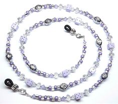 This listing is for a brand new handmade Swarovski Crystal Purple Dice Eyeglass Chain/Holder....The chain is made with the following: 4mm Swarovski Bicone Crystals in Violet and Clear, 11/0 Metallic Purple Seed Beads, 4x6mm Faceted Clear Crystal Rondelles, 6mm Purple Acrylic Dice Beads, 8x6 Lavender Aluminum Diamond Cut Oval Beads, 6/0 Seed beads in Clear Silver-Lined and Matte Metallic Purple....The lobster clasps allows you to easily change out the holders; connect the lobster clasp together a Beaded Metal Glasses Chains As Gift, Metal Beaded Glasses Chains For Gifts, Metal Beaded Glasses Chains As Gift, Purple Glass Glasses Chains As Gift, Handmade Metal Glasses Chains As Gift, Handmade Silver Glasses Chains For Gift, Handmade Silver Glasses Chains As Gift, Purple Dice, Eyeglass Chain Holders