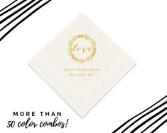 a white napkin with a gold wreath on it and the words save more than 50 color combos