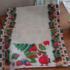 the table cloth has been decorated with christmas decorations