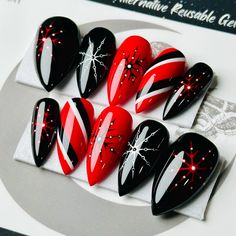 Welcome to LD Nails!  Hi, I'm Bur and I'll be your long distance nail ghoul 😜 Read on for the obligatory written description of what you see in the pictures, plus some other important stuff..  🖤 One set of 10 REUSABLE Press On Nails 🖤 Sinister Snowflake: black red and white hand painted snowflake Christmas press on nails. 👉 Please leave your finish preference and (if applicable) custom sizing in the personalization box!  Est. 2020: LD Nails specializes in custom Gothic, Witchy and Alternative Press On Nails. I draw inspiration from what I love, so you'll find heavy gothic influences to much of the offerings in my shop!  5 ⭐️ Rating on Etsy & 1000's of orders shipped between this shop and my website!  Check out my other listings to see what else I've got! https://www.etsy.com/ca/shop/LD Emo Nail Art Goth, Black Red Christmas Nails, Black And Pink Christmas Nails, Red Black Silver Nails, Gothmas Nails, Black Christmas Nails Winter, Emo Christmas Nails