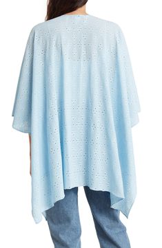 Eyelet embroidery sweetens the look of a billowy ruana that instantly upgrades any ensemble. 45" x 30" Open front No collar Short sleeves 95% polyester, 5% spandex Machine wash, dry flat Imported One Size Shawl Poncho For Spring, Blue Oversized Poncho For Spring, Oversized Blue Poncho For Spring, Oversized Shawl Poncho For Spring, Eyelet Embroidery, Front Open, Nine West, Chambray, Nordstrom Rack