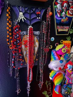 there are many necklaces hanging on the wall