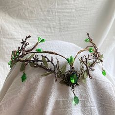 Handmade Enchanted Forest Tiara - a stunning woodland-inspired headpiece for festival lovers. Made with delicate leaves, branches, and moon details, this Elvish tiara is lightweight and sturdy. Perfect for adding a touch of magic to your outfit, it's versatile and ideal for music festivals, cosplay events, and more. Crystal Forest Crown, Tree Costume Headband, Fairy Flower Crown Wild & Free Jewelry, Floral Fairy Wedding Crown, Elf Crown Bee, Middle Earth Wedding Tiara, Viking Bridal Deer Crown, Bridal Headwear Forest Green, Wedding Woodland Tiara