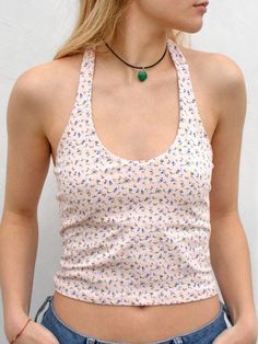 Description Material Polyester Style Leisure Fit Type Slim Sleeve length Sleeveless Pattern Type Printing & Dyeing Color Pink Collar type Halter Weight 0.1kg Length Short Season Summer Size S.M.L Size & Fit Size Guide (unit：cm) Size Bust Length S 72-82 35 M 76-86 36 L 80-90 37 Note: The size may have 1-3cm differs to manual measurement please note when you mearsure. Free Return & Exchange FREE RETURNS on all US orders! The following conditions must be met: 1. Items must be returned within 45 day Summer Stretch Tank Vest, Fitted Sleeveless Halter Top Casual Style, Fitted Sleeveless Summer Tank Top, Fitted Sleeveless Casual Tank Top, Fitted Sleeveless Tank Top Casual, Stretch Cami Vest For Summer, Summer Stretch Sleeveless Vest, Spring Tank Halter Top Vest, Fitted Floral Print Halter Neck Tank Top