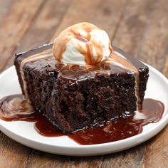 a piece of chocolate cake with ice cream on top