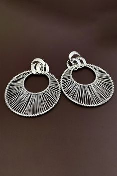 Elevate your style with our Metal Hollow Large Circle Earrings. These striking earrings feature intricate metalwork in a bold circular design, adding a touch of elegance to your look. Crafted with high-quality materials, they not only enhance your allure but also exude sophistication. Perfect for formal occasions, cocktail parties, or when you want to make a statement with your outfit, these earrings are the ideal choice to complement your ensemble with a touch of contemporary charm. Silver Round Metal Clip-on Earrings, Elegant Silver Hoop Clip-on Earrings, Elegant Round Metal Chandelier Earrings, Metal Hoop Earrings For Parties, Elegant Metal Clip-on Hoop Earrings, Elegant Metal Hoop Chandelier Earrings, Elegant Circular Metal Earrings, Elegant Clip-on Metal Hoop Earrings, Elegant Circle Metal Earrings