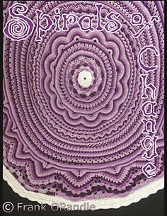 a purple and white crocheted doily with the words spirals on it