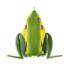 a green and yellow frog sitting on top of a white surface with its eyes closed