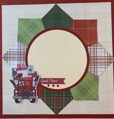 a close up of a christmas card with a red truck and green plaid pattern on it