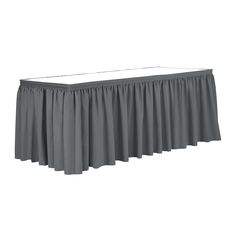 a gray table skirt with pleated edges