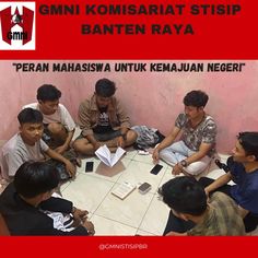 a group of young men sitting around a table with papers on top of it and the words banten raya written above them