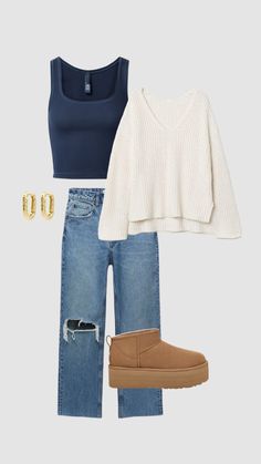 a pair of jeans, sweater and booties is featured in this image with the top off