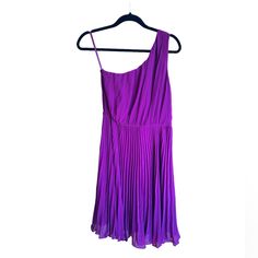 Make A Bold Statement With This Stunning Purple One-Shoulder Dress From The Limited. Perfect For Special Occasions Or A Night Out, This Dress Combines Elegance With A Playful Twist. Features: Brand: The Limited Size: 4 Color: Purple Style: One-Shoulder Design Material: Lightweight And Flowy Fabric, Perfect For Movement And Comfort Fit: Flattering Fit With A Pleated Skirt That Adds A Touch Of Sophistication Condition: Brand New With Tags Attached Additional Info: Original Belt Not Included Summer Purple Off-shoulder Midi Dress, Spring One Shoulder Pleated Mini Dress, One Shoulder Pleated Mini Dress For Summer, Sleeveless Pleated One Shoulder Dress For Summer, Pleated Sleeveless One Shoulder Dress For Summer, Sleeveless Pleated One-shoulder Dress For Summer, Purple One-shoulder Mini Dress For Summer, Chic Purple One-shoulder Dress For Summer, Summer Purple One Shoulder Mini Dress