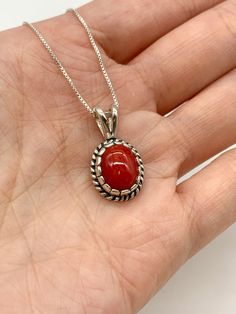 Red Coral Necklace set with a Natural Red Coral in a top grade & strong red color, at 10x8mm, 3 Cts, from Sardinia. Solid 925 Sterling Silver ☞ made to last.Matching Ring & Matching Earrings: Please ask meDetails: • Natural Red Coral sourced from Sardinia• Red Coral: 10x8mm, 3 Cts, diamond cut• Dimensions: Pendant Height 19.6mm, Width 9.2mm• Free Complimentary Chain• Solid 925 Sterling Silver ❀ Each Natural Gem is unique & will have Slight variations from the product pictures "no two Natural Sto Red Coral Necklace, Ring Matching, Coral Pendant, Matching Ring, Coral Necklace, Bar Pendant, Product Pictures, Sardinia, Red Coral