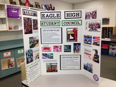 an eagle high school student council display in the library with pictures and information on it