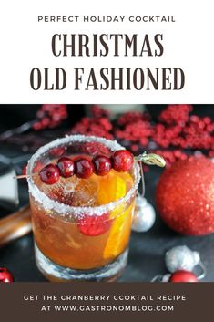 a christmas old fashioned cocktail with cranberry and orange