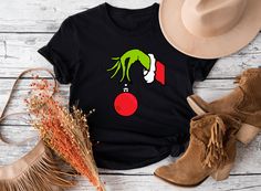 Grinch Hand T-Shirt, Grinch Hand Christmas Light Shirt, Christmas Shirt, Funny Grinch Tee, Grinch Gift Tee, Grinch Hand Shirt, Grinch Shirt ⭐⭐Tapancustomtees⭐⭐ ⭐ US customers get free shipping on any purchases totaling $35 or more. ⭐ For all colors, we utilize white vinyl; however, for white, peach, and heather athletic grey shirts, we use black vinyl. Please specify whether you want gold or black vinyl in the personalization part. ⭐8-ounce, 50/50 cotton/poly sweatshirts and hoodies. T-shirts: 100% combed ring spun cotton, 4.3-ounce.  ⭐ Return policy: Unless there is a defo on the product, we are unable to accept returns since it is print on demand type business. ⭐ Shipping: Ground Advantage delivery within 2-5 working days. You need upgrade the delivery choice if you want express shipping Vinyl Grinch Shirts, Peace Love Grinch Shirt, Grinch Christmas Shirt Teepublic, Grinch Shirts For Women, Grinch Shirts Vinyl, Funny Grinch, Grinch Hand, Grinch Shirt, Grinch Hands