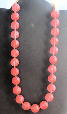 "Joan Rivers Single Strand Pink Faceted Glass Bead Necklace Vintage 1980 Single strand of large pink glass faceted beaded necklace on a gold tone chain. It measures 15\" long and can be adjusted with the lobster claw clasp. It is signed \"Joan Rivers\" on the hangtag. Excellent vintage condition." Party Necklaces With Lobster Clasp And Round Beads, Pink Round Beaded Necklaces With Faceted Beads, Pink Round Beaded Necklace With Faceted Beads, Pink Faceted Beaded Round Necklace, Pink Faceted Beads Necklace, Pink Beaded Necklaces With Lobster Clasp, Pink Faceted Beads Jewelry For Formal Occasions, Pink Gemstone Beads Necklaces For Party, Pink Faceted Round Bead Necklaces