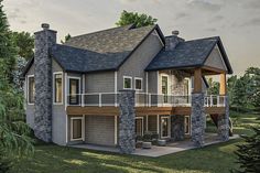 this is an artist's rendering of a two story house with stone pillars and balconies