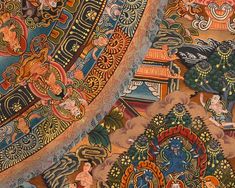 an intricately detailed painting on the ceiling in a room with many different colors and designs