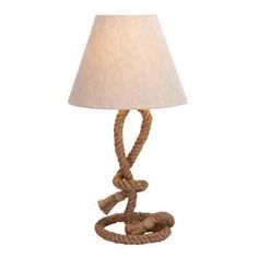 a rope lamp with a white shade on it