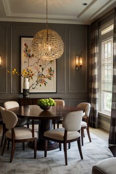 a dinning room table with chairs and a chandelier hanging from the ceiling