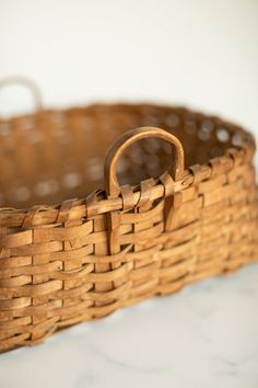 an empty basket sitting on top of a table