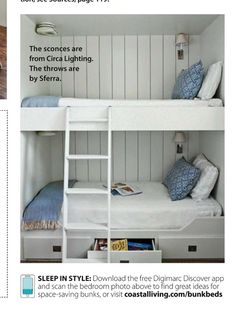 bunk beds with ladders and blue pillows in a small white children's room